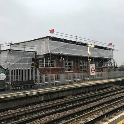 train station with scaffolding